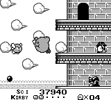 Kirby hovering up a Castle Lololo battlement