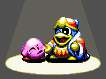 Dedede pinching Kirby's face in the lose screen