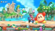 Colossal Spear Waddle Dee waving to the screen during battle at the Seaside