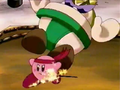 Kirby knocks the sumo figure over with a Leg Sweep.