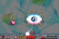 Kirby battling Kracko with the Hi-Jump ability in Kirby: Nightmare in Dream Land