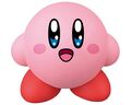 Soft vinyl figure of Kirby looking ecstatic, by Ensky