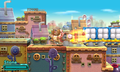 Kirby knocks some blocks around using Stone Mode.