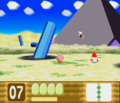 Kirby makes his way toward the big black structure in the desert