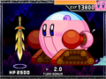 Kirby attacking Galaxia with the Tankbot