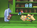 Kirby trips in Curio's collection with a priceless artifact on his head.