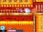 Ice Kirby countering Acchi's flame breath in Vocal Volcano - Stage 4