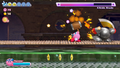 Kirby releases a Hammer Flip on Kibble Blade.