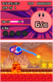 Using the heroic heart to pull the Kirbys safely over a Magu in Volcano Valley