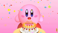 A trailer screenshot of Kirby with his 20th birthday cake