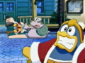 King Dedede is strangled as Escargoon and Chief Bookem pull on one of the dolls.