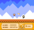 Kirby attempting to hit Poppy Bros. Sr. with a Cutter boomerang in Kirby's Adventure