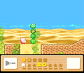 Kirby moves past the cacti with Boten on top.