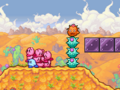 A Stactus stack blocks the way and forces the Kirbys to jump over.