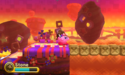 Kirby stands at the near edge of a crumbling bridge.