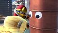 King Dedede about to smash a metal drum right in the face