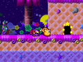 Kirby and Bio Spark head inside a cave.