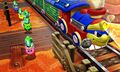 Screenshot of Kirbys chasing after a Dedede-themed train to deposit ores