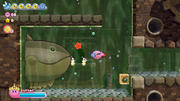 Kirby comes face to face with a giant Barbar guarding a round-trip door.