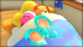 Picture of the main mode credits, showing Kirby, Elfilin and an Awoofy sleeping in the house's bed