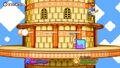 A battle taking place on Butter Building in Kirby Fighters 2