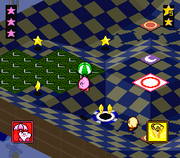 Kirby tries to nab the cup using the Parasol.