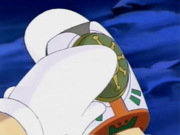 Knuckle Joe inserts his medallion into the device.
