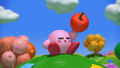 Kirby on a hill with his apple