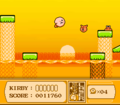 Kirby floats on by at the tangerine coast to reach the stage exit.
