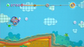 Kirby bouncing off a Buttonfly using Spin Boarder in Rainbow Falls