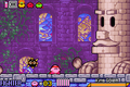 Kirby fighting King Golem in Kirby & The Amazing Mirror