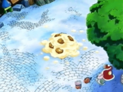Kirby is buried in a pile of Belly Buster's pies.