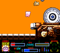 Kirby tries to get away from the cannon's grabber arm.