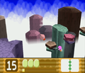 Kirby hops across impossibly-floating stacks of rock that crumble when he steps on them.