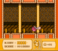 Kirby gets grabbed and tossed by a red Rolling Turtle in the tower.