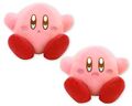 Two plushies of Kirby with a battery that makes them bounce