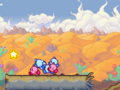 The Kirbys travel across a log to get to the next part of the level.