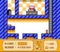 Kirby enters a tower, where a Big Switch can be seen in an isolated room.