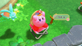 Kirby catching a small Blipper in the Flash Fishing sub-game from Kirby and the Forgotten Land