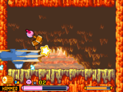 In Kirby: Squeak Squad, Kirby is battling Gao Gao in Vocal Volcano - Stage 3.