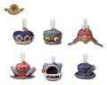 Hat keychain plushies from the "Kirby's Dreamy Gear" merchandise line, featuring Meta Knight's hat