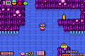 Kirby swimming near an underwater battery in Cabbage Cavern