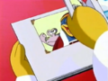 King Dedede notices the intruding snail in his photo-book
