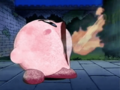 Kirby inhales a torch thrown to him by Meta Knight.