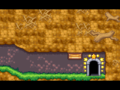 A gate opens, allowing the Kirbys to access a door at the end of the passage