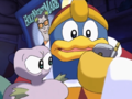 King Dedede receives a cell phone from the N.M.E. Sales Guy.