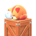 Figure of an Awoofy sleeping on a wooden crate from Kirby and the Forgotten Land