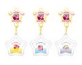 Set of three Kirby-themed domed keychains