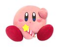 Big "Mochi Mochi" plushie of Kirby holding a pen that resembles the Star Rod