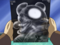Mr. Chip examines an x-ray of King Dedede's head to determine the cause of his learning issues.